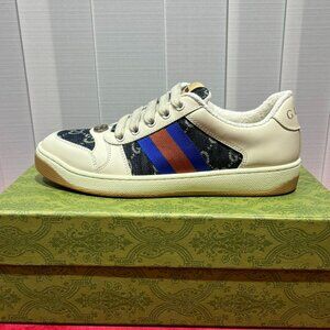 Stylish Cream Sneakers with Red and Blue Stripes